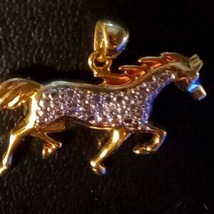 Diamond accent gold tone horse pendant